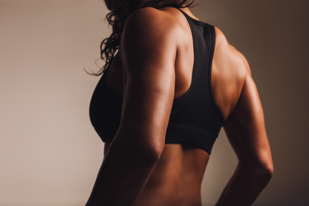 women in black sports bra